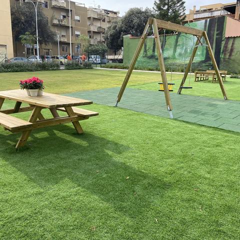 Photo of the playground area and of the rest of the amenties implemented within the project.