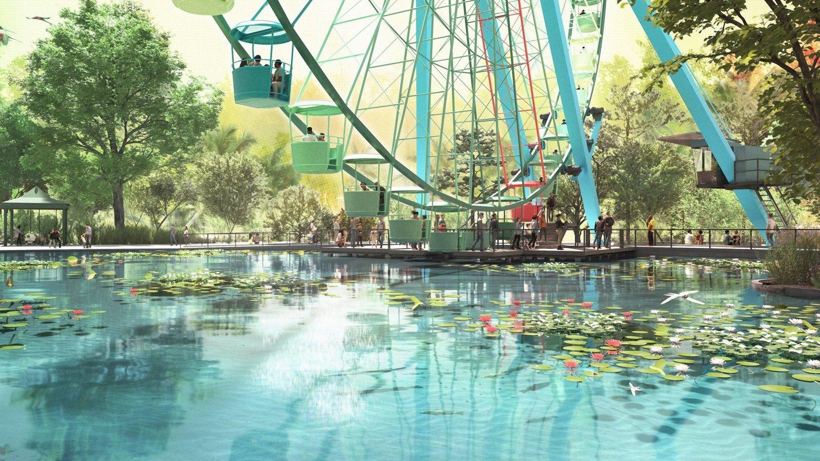 The Ferris wheel is hovering above the pond
